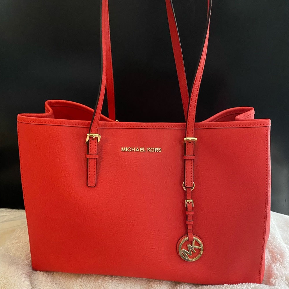 red michael kors purse